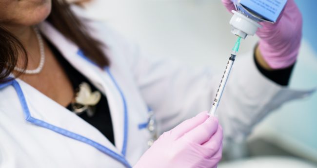 aesthetic-doctor-preparing-the-syringe-with-the-bo-2021-05-10-01-17-10-utc Dermal Filler Treatment at Vishka Skincare